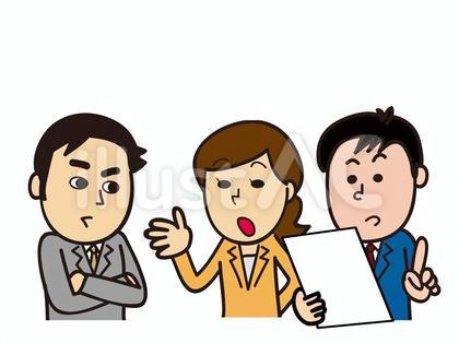 意見交換しているスーツの男女