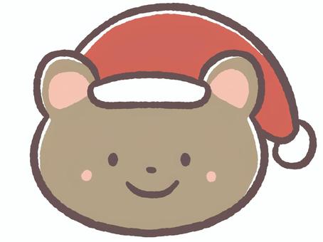 冬のクリスマスのサンタクロース帽子の熊