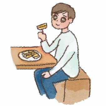 おやつを食べる男の子