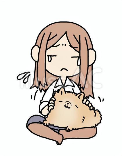 犬を撫でる泣く女性