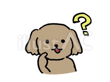 首をかしげる犬