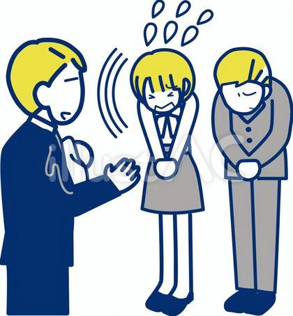 平謝りする男女会社員