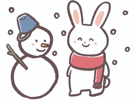 冬の寒い日に雪だるま作る動物のうさぎ 雪だるま,冬,寒いのイラスト素材