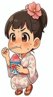 暑い中、座ってかき氷を食べる女の子
