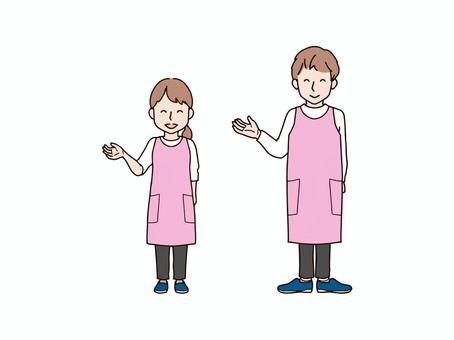 片手を上げる男女_エプロンp 大人,男性,女性,男女,ペア,おそろい,全身,エプロン,ズボン,パンツのイラスト素材