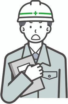 ネガティブな作業員の男性