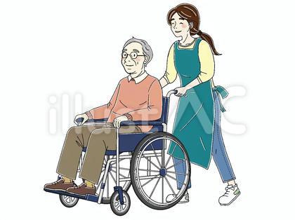 車椅子に乗るシニア男性とヘルパーさん