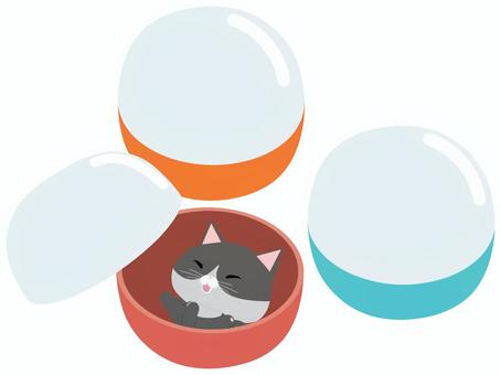 カプセルに入る笑顔のはちわれ猫 カプセル,トイ,猫,はちわれ,笑顔,動物,かわいい,おもちゃ,景品のイラスト素材