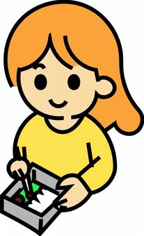 弁当作りをしていいる女の子 弁当作りをしていいる女の子 お弁当作り,料理,クッキング,日常,支度,朝,ほのぼの,手作り,家庭的,女の子のイラスト素材