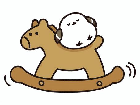 木馬に乗って居眠りするシマエナガ シマエナガ,エナガ,野鳥,鳥,動物,木馬,木工,馬,午年,玩具のイラスト素材