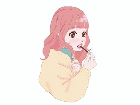 お菓子を食べる女性