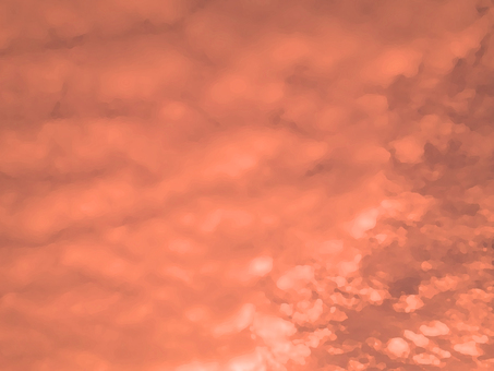 夕焼雲のような柄のオレンジ色の抽象背景 グラデーション,雲,夕焼,オレンジ,もくもく,凹凸,でこぼこ,シック,エレガント,おしゃれのイラスト素材