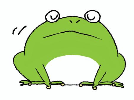 目を瞑るカエル