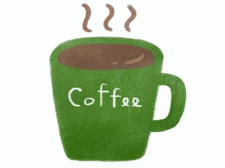 緑色のマグカップに入ったホットコーヒー