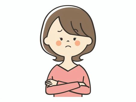 困った表情の若い女性