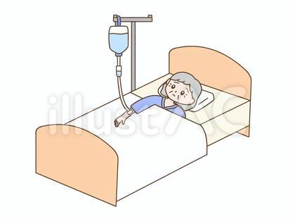 入院して点滴をする高齢者の女性