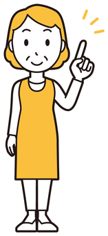  エプロンおばちゃん(黄)-125-全身 指差し,笑顔,おばちゃん,エプロン,お母さん,ママ,中年,おばさん,主婦,人物のイラスト素材