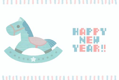 木馬の午年年賀状（横型） 年賀状,午年,木馬,ハッピーニューイヤー,はがき,横型,横向き,かわいい,メルヘン,ポップのイラスト素材
