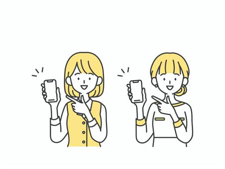 スマホを指差す受付と美容部員の女性 人物,女,スマホ,携帯,指差し,説明,営業,窓口,受付,フロントのイラスト素材