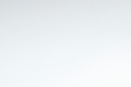 淡いグレーから白へのグラデーション背景