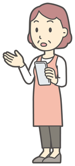  スマホを持って喋っている中年の女性 話す,おばさん,人,女性,中年,おばちゃん,シニア,ママ,主婦,ヘルパーのイラスト素材