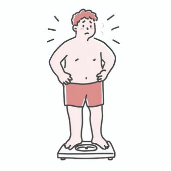 体重計に乗る心配そうな男性