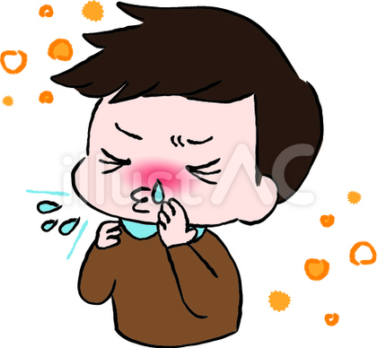 花粉症でくしゃみをする男の人