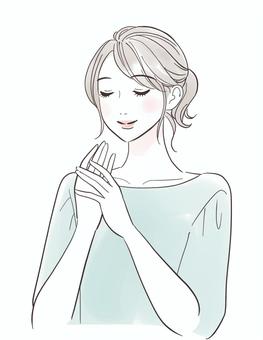 笑顔でハンドケアをする女性 女性,人物,きれい,おしゃれ,可愛い,表情,スキンケア,肌,触る,ケアのイラスト素材