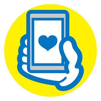 画面にハートがあるスマホを持つ手