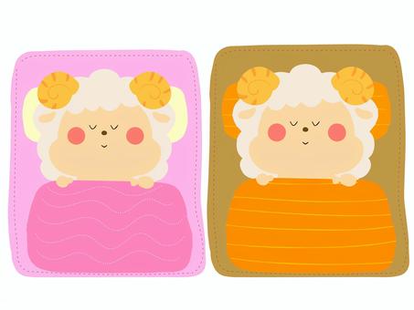 布団で寝る双子の羊