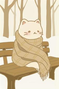 ベンチに座るマフラー猫 猫,マフラー,襟巻,スカーフ,ストール,ブランケット,防寒,布,温かい,冬のイラスト素材