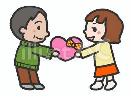 お父さんにプレゼントを渡す女の子