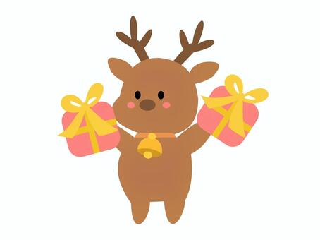 トナカイ全身③プレゼント トナカイ,クリスマス,プレゼント,ピンク,黄色,茶色,ベル,贈り物,かわいい,12月のイラスト素材