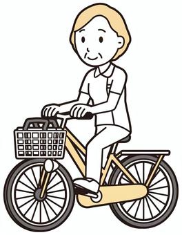  高齢看護師(黄)-495-全身 自転車,プラチナナース,看護師,高齢,女性,老人,白衣,ナース,医療,病院のイラスト素材