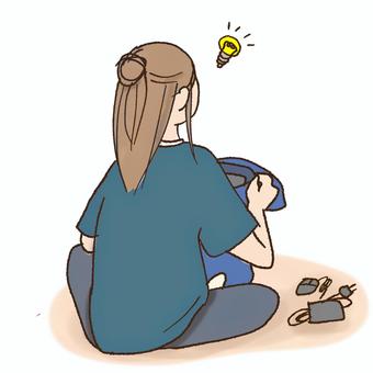 荷物詰めててひらめいた! 荷物詰めててひらめいた! ひらめく,電球,光るのイラスト素材