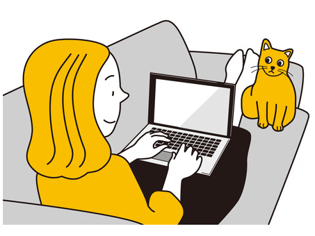 A woman lying on the sofa and operating a computer A woman lying on the sofa and operating a computer