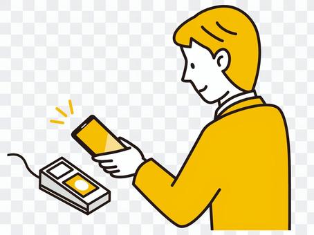 Men paying with smartphones Men paying with smartphones