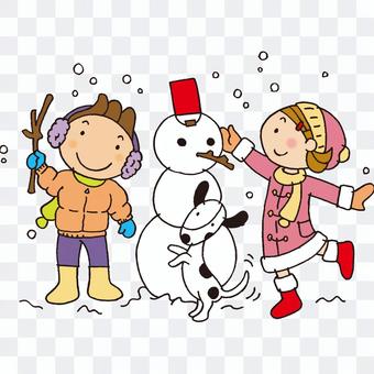 Child making a snowman Child making a snowman