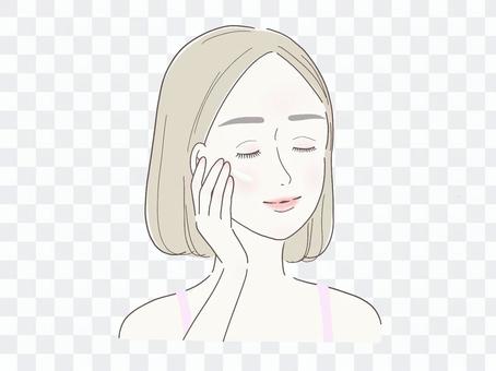 Woman applying skin care cream Woman applying skin care cream
