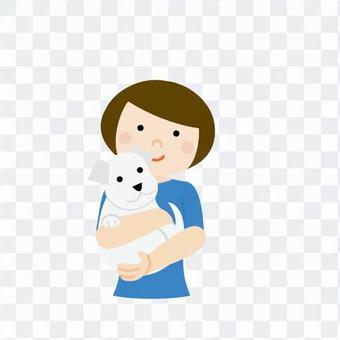 A woman holding a dog A woman holding a dog