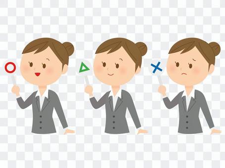 A woman with a suit ◯ △ × A woman with a suit ◯ △ ×