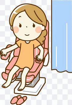 A girl on a gynecological examination table A girl on a gynecological examination table