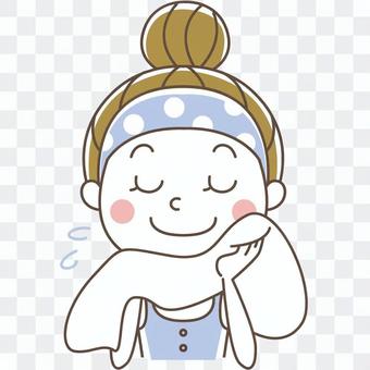 Woman wiping face Woman wiping face