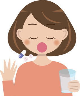 Woman taking medicine Woman taking medicine