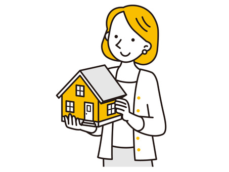A woman with a model of her own home A woman with a model of her own home