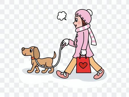 A girl walking with a pet dog A girl walking with a pet dog