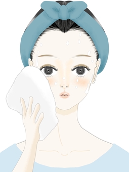 Woman wiping her face with a towel Woman wiping her face with a towel