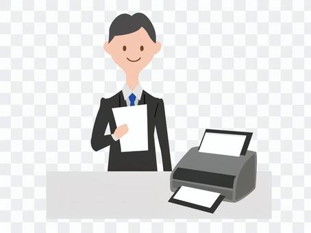 A man using a printer A man using a printer