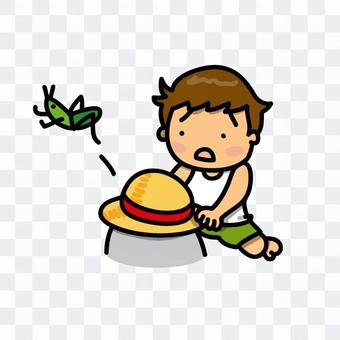 A boy trying to grab a grasshopper A boy trying to grab a grasshopper