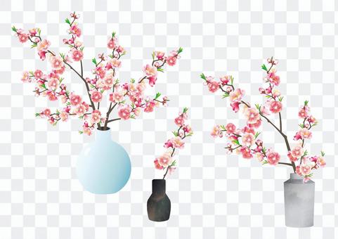 花瓶に活けた枝付きの花桃 花瓶に活けた枝付きの花桃